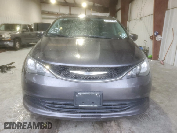 2020 Chrysler Voyager LXi z VIN 2C4RC1DG9LR256949, wystawiony jako Copart lot #55558855 z przebiegiem 182 840 mil mil oraz Tytuł czysty. Historia ofert i sprzedaży dostępna na DreamBid. Obrazek 5.