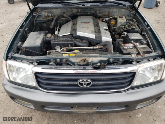 2002 Toyota Land Cruiser with VIN JTEHT05J022029822, listed as a Copart auction lot 73220774 with 436,532 mi miles and Clean Title. Bid and sale history available at carsss.com. Image 12.