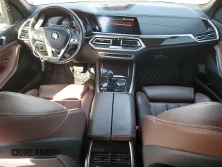 2020 BMW X5 xDrive40i with VIN 5UXCR6C09L9C13127, listed as a Copart auction lot 53941035 with 76,685 mi miles and Salvage title. Bid and sale history available at DreamBid. Image 8.