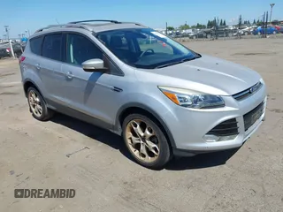2014 Ford Escape Titanium с VIN 1FMCU0J94EUB80786, выставлен на аукционе IAAI как лот 42528581 с пробегом 29 158 миль миль и . История ставок и продаж доступна на DreamBid. Изображение 1.