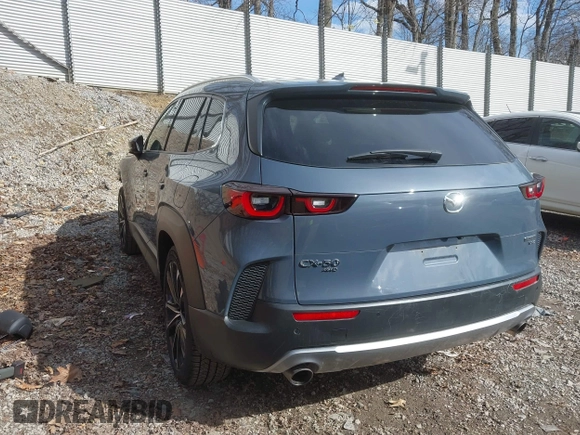 2023 Mazda CX-50 2.5 Turbo Premium Plus Package with VIN 7MMVABEY1PN101123, listed as a IAAI auction lot 41858602 with 34,541 mi miles. Bid and sale history available at carsss.com. Image 22.