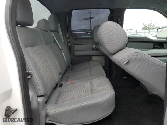2013 Ford F-150 XL with VIN 1FTFW1CF5DFD27219, listed as a Copart auction lot 50928335 with 118,025 mi miles and Salvage Title. Bid and sale history available at carsss.com. Image 10.