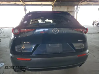 2020 Mazda CX-30 with VIN 3MVDMABL5LM134294, listed as a Copart auction lot 81180274 with 140,530 mi miles and Salvage Title. Bid and sale history available at DreamBid. Image 6.