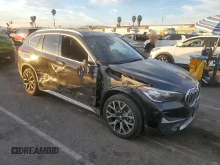 2022 BMW X1 sDrive28i with VIN WBXJG7C07N5U58359, listed as a Copart auction lot 86908624 with 34,557 mi miles and Salvage Title. Bid and sale history available at carsss.com. Image 4.