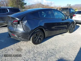 2024 Tesla Model Y Long Range with VIN 7SAYGDEE7RF199673, listed as a IAAI auction lot 41263305 with 3,137 mi miles and . Bid and sale history available at DreamBid. Image 4.