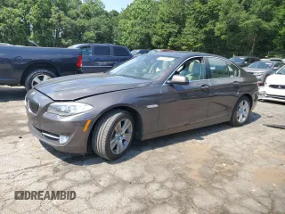 2013 BMW 5 Series 528i with VIN WBAXG5C56DD233830, listed as a Copart auction lot 63763865 with 76,831 mi miles and Salvage title. Bid and sale history available at DreamBid. Image 1.