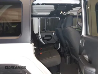 2021 Jeep Wrangler Unlimited Freedom with VIN 1C4HJXDNXMW681267, listed as a IAAI auction lot 42026181 with 40,143 mi miles and . Bid and sale history available at DreamBid. Image 8.