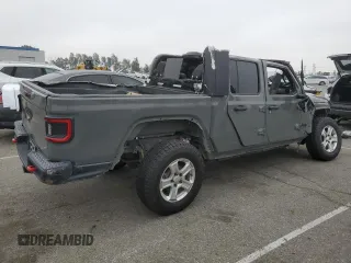 2020 Jeep Gladiator Sport S z VIN 1C6HJTAG6LL193553, wystawiony jako Copart lot #55638915 z przebiegiem 84 600 mil mil oraz Szkoda całkowita • Salvage title. Historia ofert i sprzedaży dostępna na DreamBid. Obrazek 3.