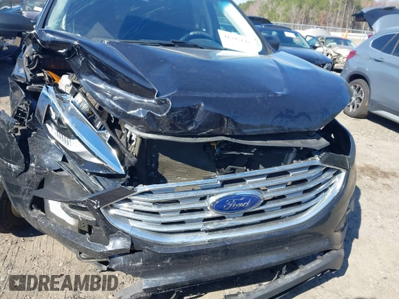 2020 Ford Edge SE z VIN 2FMPK3G97LBA92060, wystawiony jako IAAI lot #41791142 z przebiegiem 59 578 mil mil oraz . Historia ofert i sprzedaży dostępna na DreamBid. Obrazek 19.