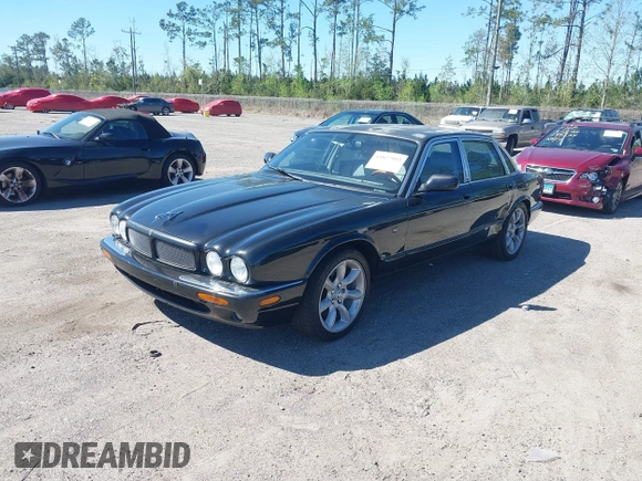 2000 Jaguar XJ with VIN SAJDA15B2YMF14634, listed as a IAAI auction lot 41827953 with 111,505 mi miles and . Bid and sale history available at DreamBid. Image 2.