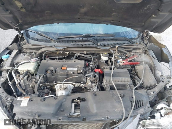 2019 Honda Civic Sedan LX with VIN 19XFC2F60KE018100, listed as a IAAI auction lot 41908486 with 124,357 mi miles. Bid and sale history available at carsss.com. Image 10.