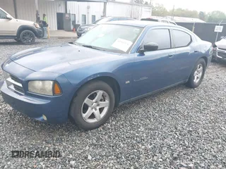 2009 Dodge Charger SXT with VIN 2B3KA33V39H585083, listed as a IAAI auction lot 41911176 with 134,600 mi miles and . Bid and sale history available at carsss.com. Image 2.