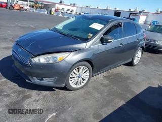 2017 Ford Focus Titanium with VIN 1FADP3N25HL299817, listed as a IAAI auction lot 42161440 with 154,974 mi miles and . Bid and sale history available at carsss.com. Image 2.