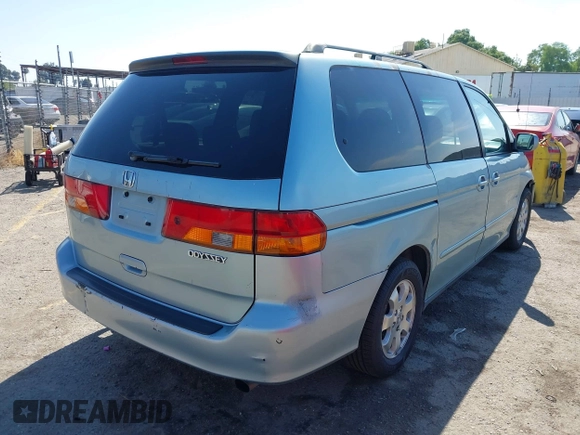 2003 Honda Odyssey EX-L with VIN 5FNRL18973B148675, listed as a IAAI auction lot 41992952 with 232,013 mi miles and . Bid and sale history available at DreamBid. Image 4.
