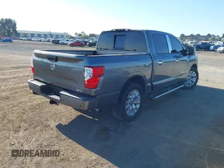 2020 Nissan Titan Platinum Reserve with VIN 1N6AA1EF8LN512582, listed as a IAAI auction lot 42236611 with 18,375 mi miles and . Bid and sale history available at DreamBid. Image 4.