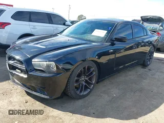 2013 Dodge Charger RT with VIN 2C3CDXCT2DH503048, listed as a IAAI auction lot 41856741 with 88,750 mi miles and . Bid and sale history available at carsss.com. Image 2.