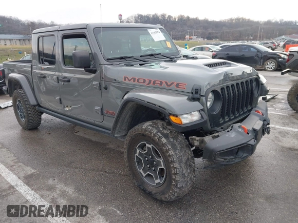 2022 Jeep Gladiator Mojave z VIN 1C6JJTEG8NL130971, wystawiony jako IAAI lot #41163074 z przebiegiem 47 142 mil mil oraz . Historia ofert i sprzedaży dostępna na DreamBid. Obrazek 1.
