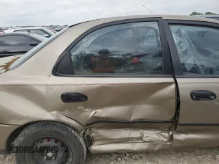 1997 Mazda Protege DX z VIN JM1BC1414V0103244, wystawiony jako Copart lot #56219745 z przebiegiem Nie podano mil oraz Szkoda całkowita • Salvage title. Historia ofert i sprzedaży dostępna na DreamBid. Obrazek 10.