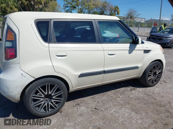 2010 Kia Soul + with VIN KNDJT2A24A7044597, listed as a IAAI auction lot 41798936 with 152,707 mi miles. Bid and sale history available at carsss.com. Image 14.