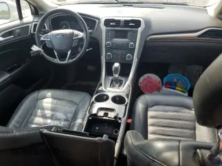 2013 Ford Fusion SE с VIN 3FA6P0HR0DR116142, выставлен на аукционе Copart как лот 59493755 с пробегом 121 705 миль миль и Списание • Salvage title. История ставок и продаж доступна на DreamBid. Изображение 8.