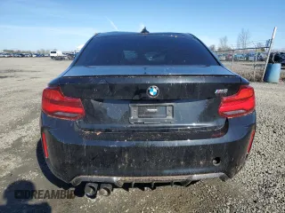 2018 BMW M2 z VIN WBS1J5C53J7B70153, wystawiony jako Copart lot #47081155 z przebiegiem Nie podano mil oraz Szkoda całkowita • Salvage title. Historia ofert i sprzedaży dostępna na DreamBid. Obrazek 6.