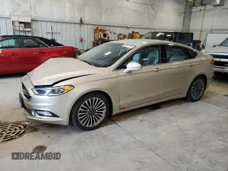 2017 Ford Fusion Hybrid Titanium with VIN 3FA6P0RU3HR360053, listed as a Copart auction lot 63063715 with 127,534 mi miles and Non repairable. Bid and sale history available at DreamBid. Image 1.