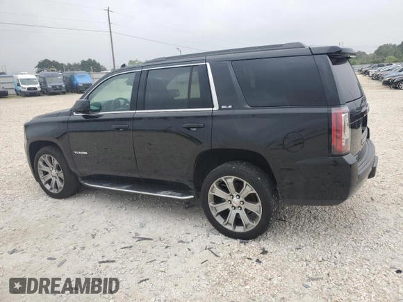2020 GMC Yukon SLE with VIN 1GKS1AKC9LR121150, listed as a Copart auction lot 76456314 with 61,119 mi miles and Salvage Title. Bid and sale history available at carsss.com. Image 2.