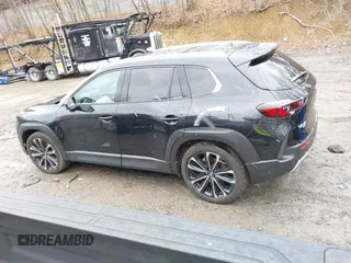 2024 Mazda CX-50 Premium z VIN 7MMVABDYXRN180263, wystawiony jako IAAI lot #41738791 z przebiegiem 9 688 mil mil oraz . Historia ofert i sprzedaży dostępna na DreamBid. Obrazek 14.