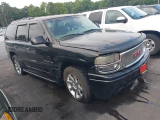 2002 GMC Yukon Denali z VIN 1GKEK63U32J106784, wystawiony jako IAAI lot #42434028 z przebiegiem 310 141 mil mil oraz . Historia ofert i sprzedaży dostępna na DreamBid. Obrazek 1.