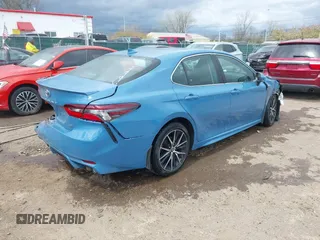 2023 Toyota Camry SE with VIN 4T1S11AK4PU099996, listed as a IAAI auction lot 42038558 with 27,279 mi miles. Bid and sale history available at carsss.com. Image 4.