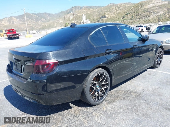 2013 BMW 5 Series 528i with VIN WBAXG5C50DDY35638, listed as a IAAI auction lot 39657715 with 139,765 mi miles and . Bid and sale history available at carsss.com. Image 4.