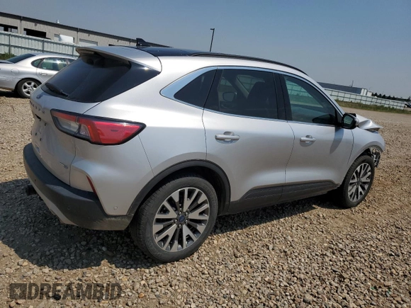 2020 Ford Escape Titanium with VIN 1FMCU9J98LUA78182, listed as a Copart auction lot 60477635 with 76,117 mi miles and Salvage title. Bid and sale history available at DreamBid. Image 3.