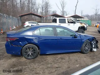 2023 Toyota Camry SE with VIN 4T1G11AK5PU094439, listed as a IAAI auction lot 41625944 with 27,743 mi miles. Bid and sale history available at carsss.com. Image 13.