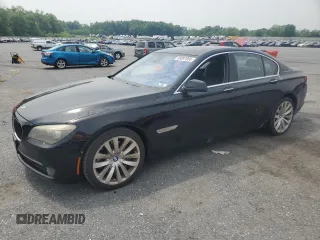 2012 BMW 7 Series with VIN WBAKX6C52CC197154, listed as a Copart auction lot 59897855 with 114,279 mi miles and Clean title. Bid and sale history available at DreamBid. Image 1.