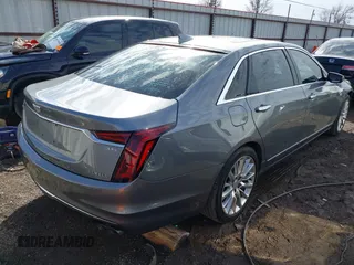 2019 Cadillac CT6 Luxury AWD z VIN 1G6KB5RS6KU117472, wystawiony jako IAAI lot #41643096 z przebiegiem 80 183 mil mil oraz . Historia ofert i sprzedaży dostępna na DreamBid. Obrazek 4.