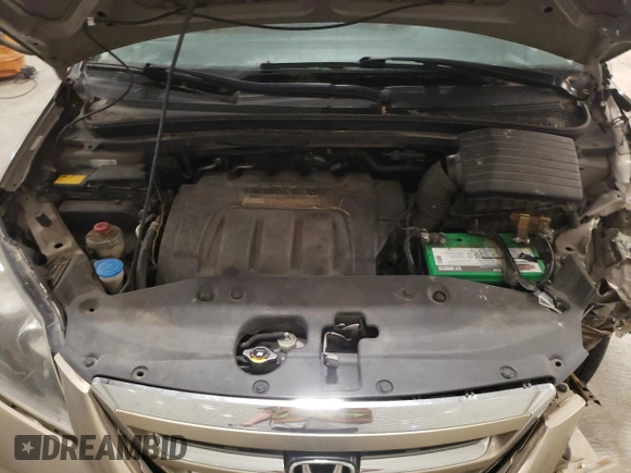 2005 Honda Odyssey EX-L z VIN 5FNRL38625B012216, wystawiony jako Copart lot #51823135 z przebiegiem 206 408 mil mil oraz Szkoda całkowita • Salvage title. Historia ofert i sprzedaży dostępna na DreamBid. Obrazek 12.
