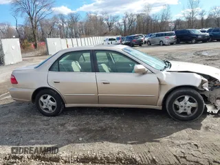 2000 Honda Accord EX z VIN 1HGCG6672YA069215, wystawiony jako IAAI lot #41508330 z przebiegiem 138 721 mil mil oraz . Historia ofert i sprzedaży dostępna na DreamBid. Obrazek 13.