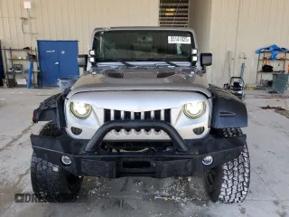 2016 Jeep Wrangler Unlimited Sport с VIN 1C4BJWDG5GL329916, выставлен на аукционе Copart как лот 55141825 с пробегом 54 074 миль миль и Списание • Salvage title. История ставок и продаж доступна на DreamBid. Изображение 5.