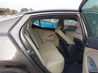 2015 Kia Optima LX with VIN 5XXGM4A74FG401418, listed as a IAAI auction lot 41899008 with 125,812 mi miles. Bid and sale history available at carsss.com. Image 8.