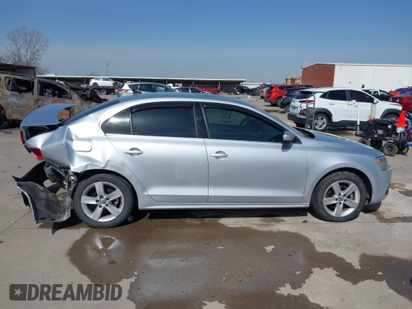 2014 Volkswagen Jetta TDI w/Premium with VIN 3VWLL7AJ6EM424935, listed as a IAAI auction lot 41533634 with 64,028 mi miles and . Bid and sale history available at DreamBid. Image 13.
