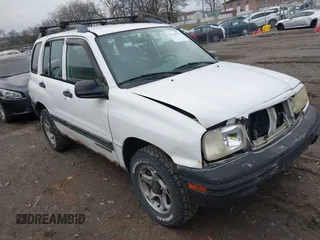 2001 Chevrolet Tracker z VIN 2CNBJ13CX16910826, wystawiony jako IAAI lot #41510123 z przebiegiem 227 355 mil mil oraz . Historia ofert i sprzedaży dostępna na DreamBid. Obrazek 1.