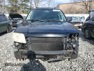 2005 Mercury Mariner Luxury z VIN 4M2CU57155DJ10663, wystawiony jako Copart lot #49102695 z przebiegiem 122 025 mil mil oraz Nie do naprawy. Historia ofert i sprzedaży dostępna na DreamBid. Obrazek 5.