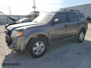 2010 Ford Escape XLT with VIN 1FMCU0DG6AKD05058, listed as a Copart auction lot 50449035 with 127,781 mi miles and Salvage Title. Bid and sale history available at carsss.com. Image 1.