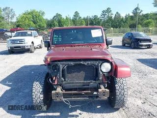 2007 Jeep Wrangler Unlimited Sahara с VIN 1J8GA59187L211825, выставлен на аукционе IAAI как лот 42313099 с пробегом 107 554 миль миль и . История ставок и продаж доступна на DreamBid. Изображение 13.