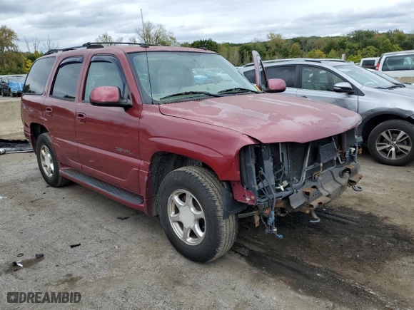 2004 GMC Yukon Denali with VIN 1GKEK63U94J135340, listed as a Copart auction lot 74230534 with 164,235 mi miles and Salvage Title. Bid and sale history available at carsss.com. Image 4.