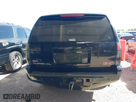 2012 GMC Yukon XL SLT with VIN 1GKS2KE77CR178173, listed as a IAAI auction lot 41778706 with 175,654 mi miles. Bid and sale history available at carsss.com. Image 16.