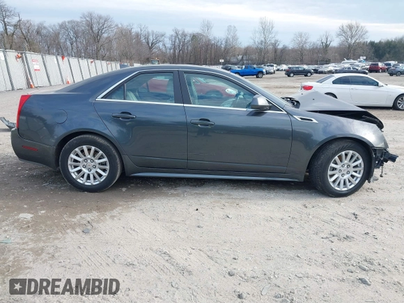 2012 Cadillac CTS Luxury z VIN 1G6DE5E51C0112608, wystawiony jako IAAI lot #41656992 z przebiegiem Nie podano mil oraz . Historia ofert i sprzedaży dostępna na DreamBid. Obrazek 13.
