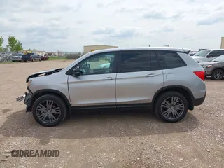 2020 Honda Passport EX-L with VIN 5FNYF8H59LB014260, listed as a IAAI auction lot 42274421 with 111,830 mi miles and . Bid and sale history available at DreamBid. Image 15.