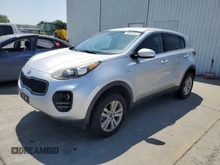 2018 Kia Sportage LX z VIN KNDPMCAC9J7329866, wystawiony jako Copart lot #59943585 z przebiegiem 93 067 mil mil oraz Czysty tytuł • Clean title. Historia ofert i sprzedaży dostępna na DreamBid. Obrazek 1.