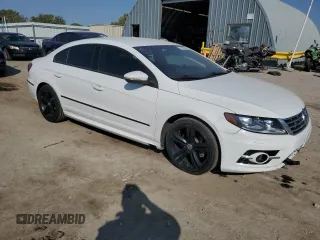 2014 Volkswagen CC R-Line with VIN WVWBN7AN2EE535855, listed as a Copart auction lot 75706934 with 148,889 mi miles and Salvage Title. Bid and sale history available at carsss.com. Image 4.